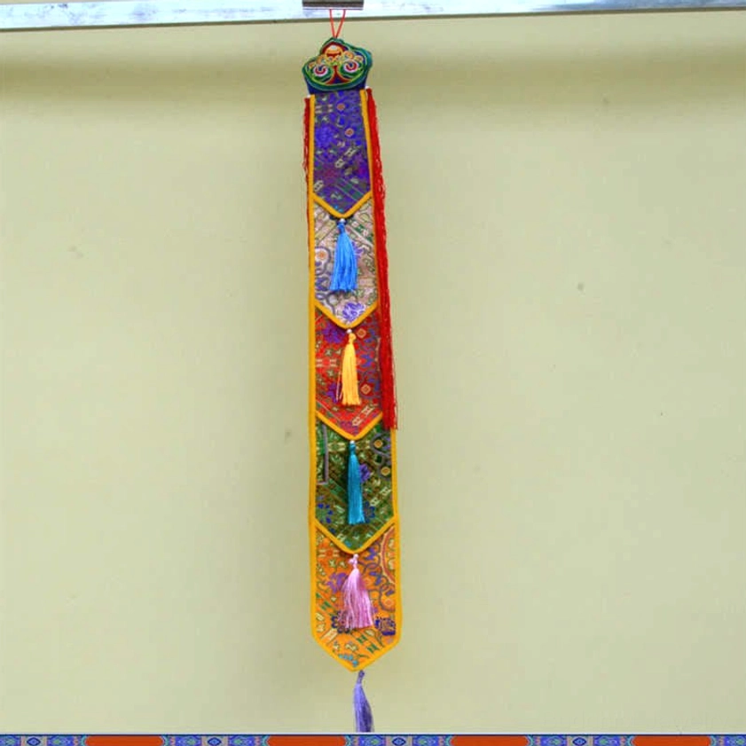 Lotus flower Buddhist tassel ornament with embroidered enlightenment symbolism
