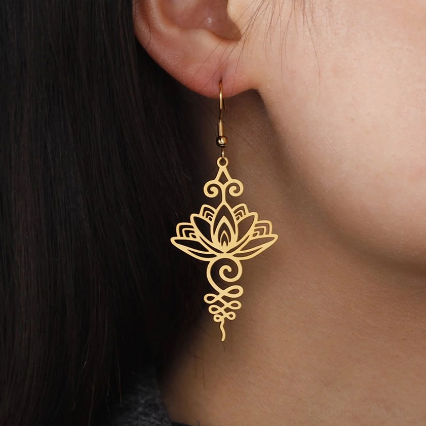 Buddhist lotus drop earrings multiple angle view highlighting hollow filigree craftsmanship