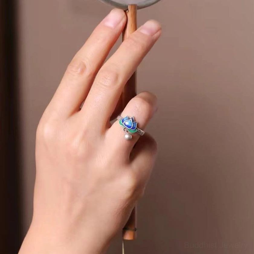 Lotus flower pattern enlightenment ring displaying vibrant cloisonné enamel design, adjustable size, and spiritual Buddhist symbolism