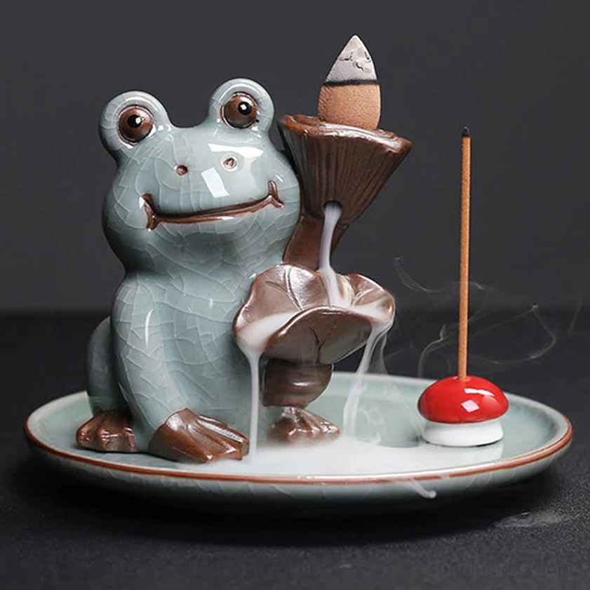 Lotus frog incense holder right-side view displaying clear incense smoke channel with red mushroom stick stand positioned for optimal smoke flow