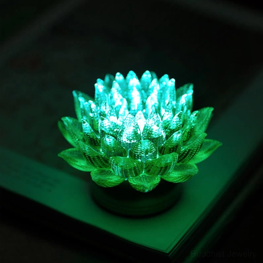 Lotus glass lamp artistic display, warm lighting creating meditative peaceful space