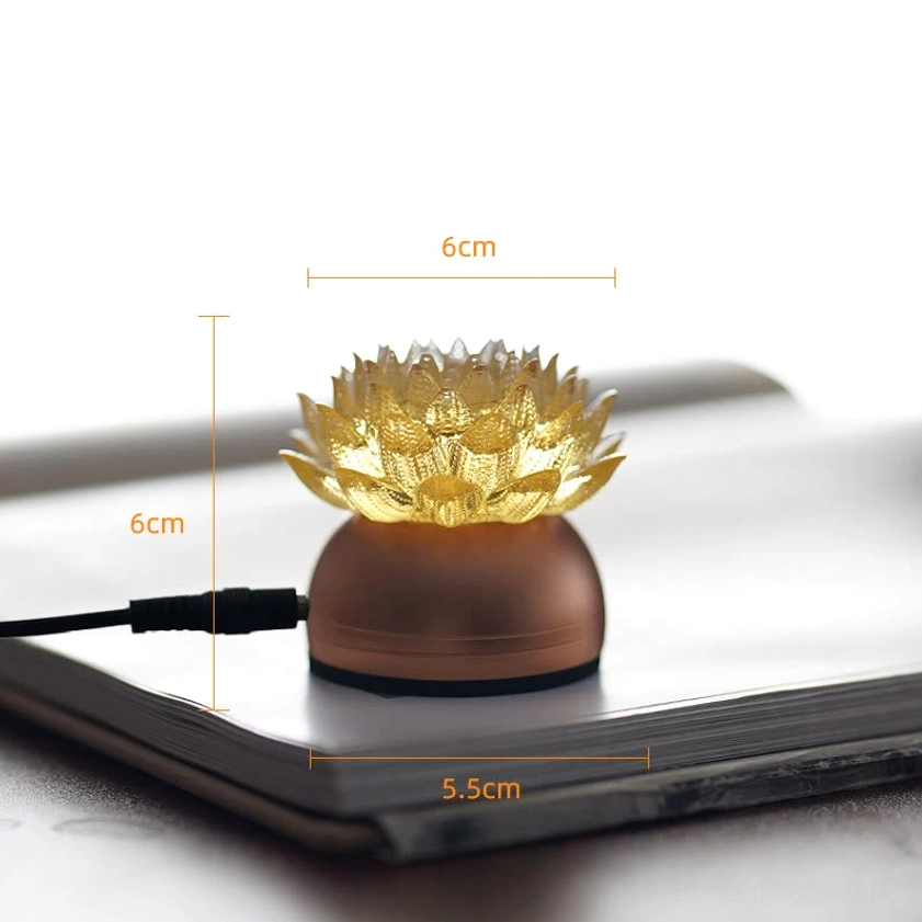 Lotus glass sculpture side angle with size measurement showing dimensions in inches and centimeters on desktop