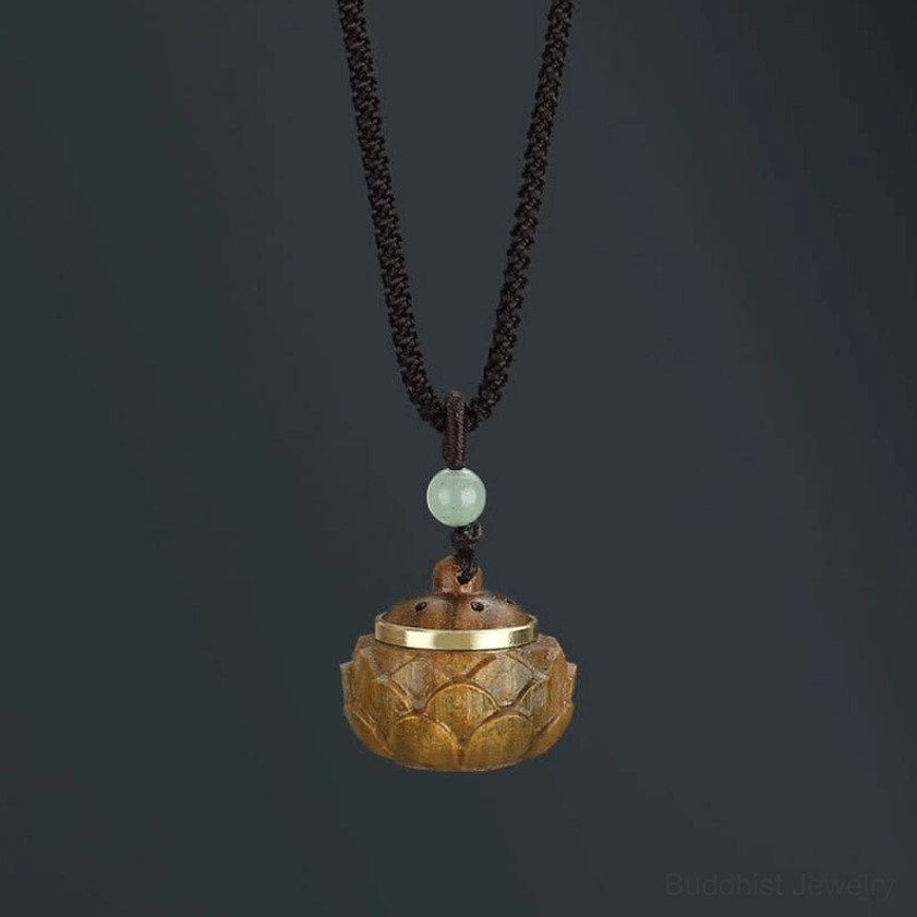 Detachable hollow lotus-shaped green sandalwood Buddhist pendant with screw-on cap and inlaid colored gemstones for aromatherapy use