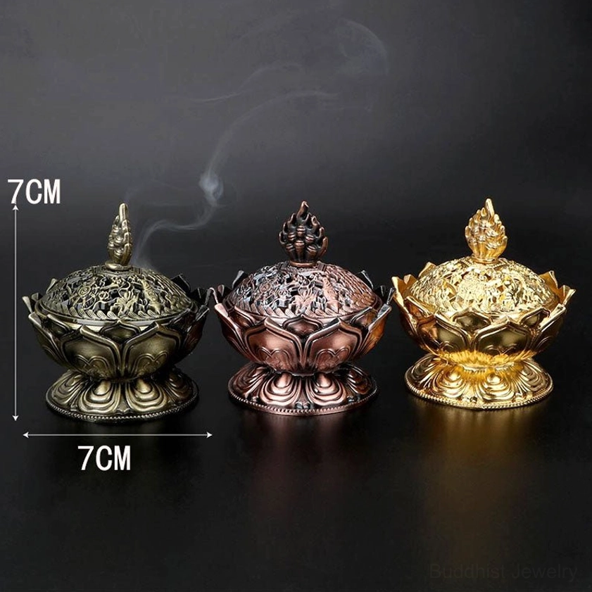 Lotus incense burner collection flat lay showing 2.8 inch size comparison with all color variants bronze red bronze and gold