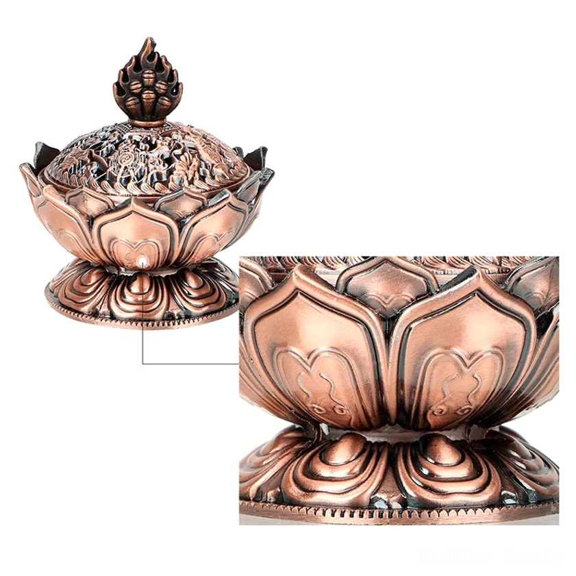 Buddhist lotus incense burner in use with aromatic smoke rising through carved openings creating waterfall effect during meditation
