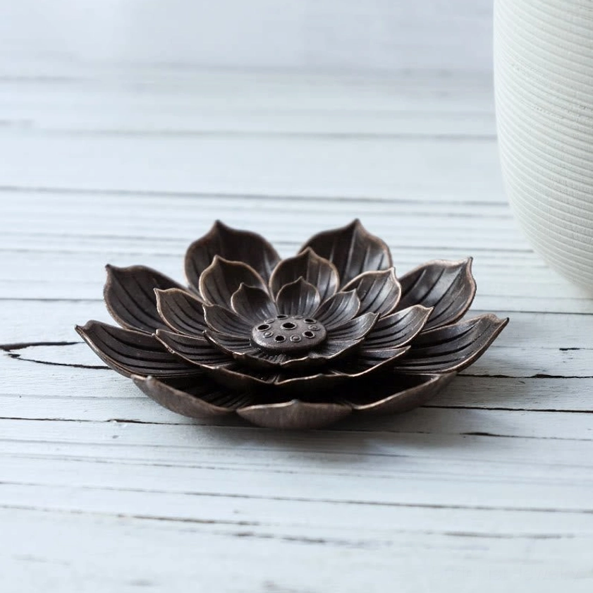 Lotus-shaped bronze metal incense holder with six holes for multiple incense sticks