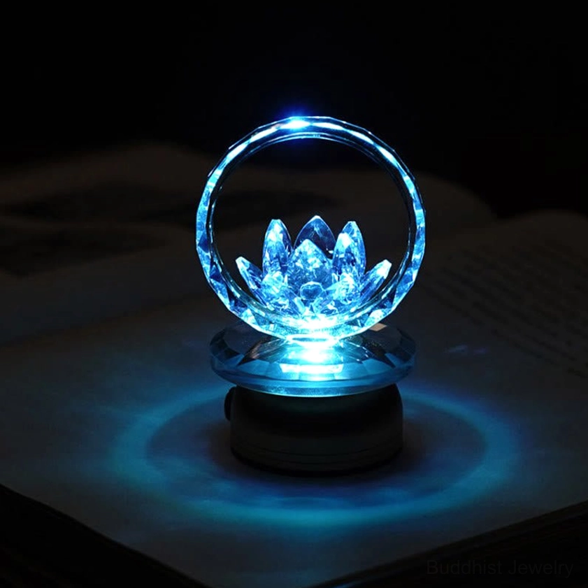Glowing crystal lotus LED lamp with faceted hoop, peaceful meditation lighting setup