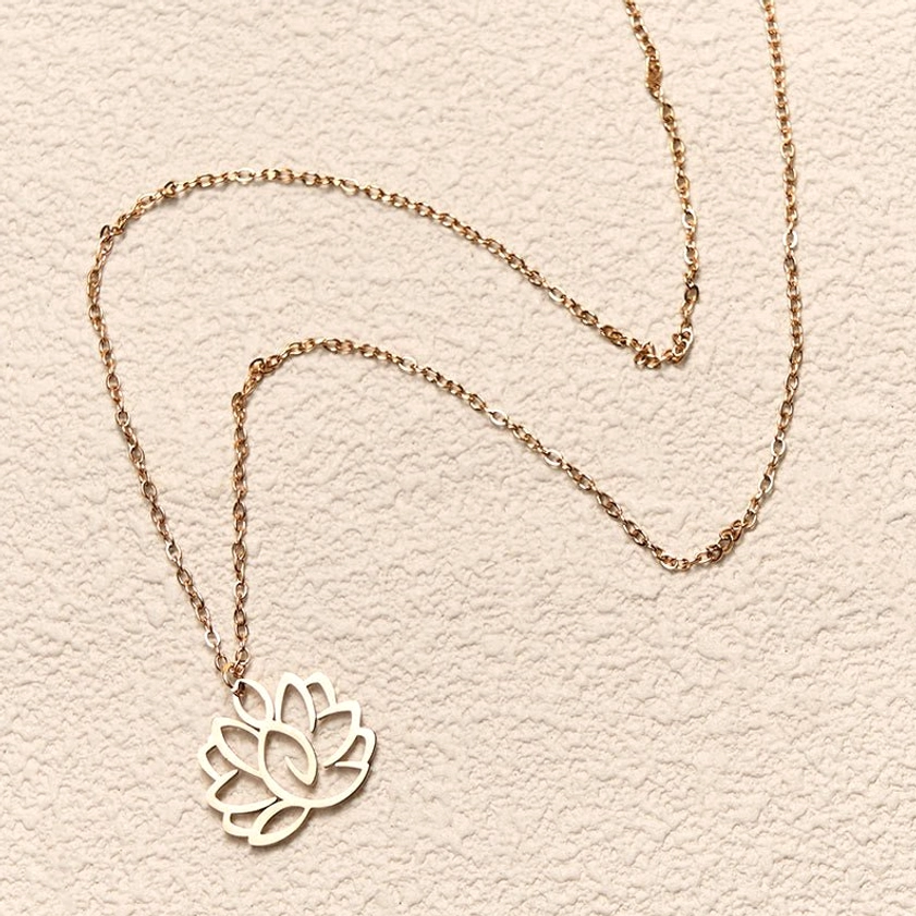 Buddhist lotus necklace craftsmanship detail showing handmade quality, hollow carved lotus pendant and polished metal finish