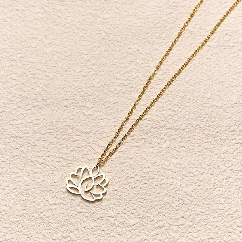 Stainless steel lotus necklace multiple angles view showing silver hollow lotus pendant versatility and chain length