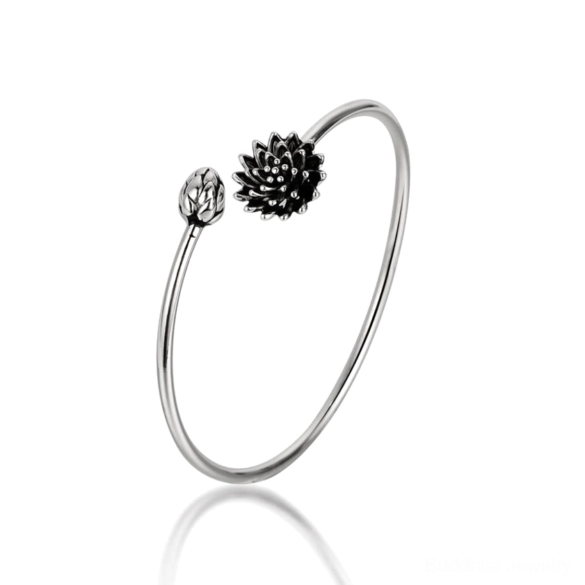 Minimalist open cuff lotus bangle with dark bloom charm, front studio view on black background