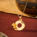 Lotus peace buckle copper necklace pendant with white jade stone, vintage tibetan style setting, gold-tone metal with 3D lotus decoration