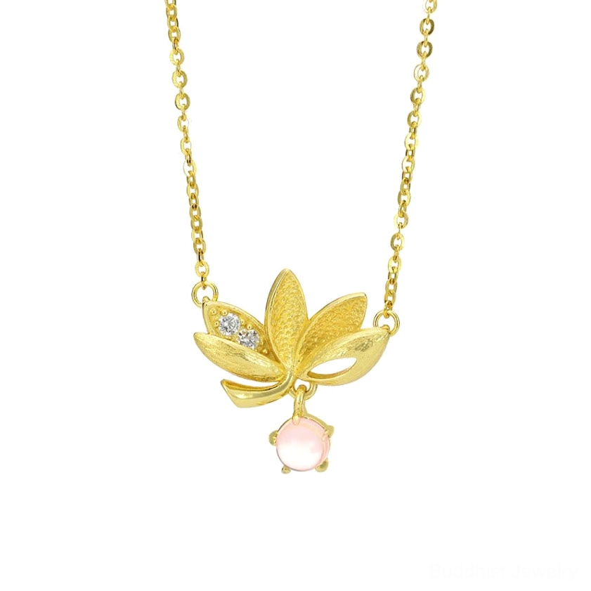 Close-up front view of 18K gold plated lotus pendant showing intricate hollow petals and pink gemstone detail