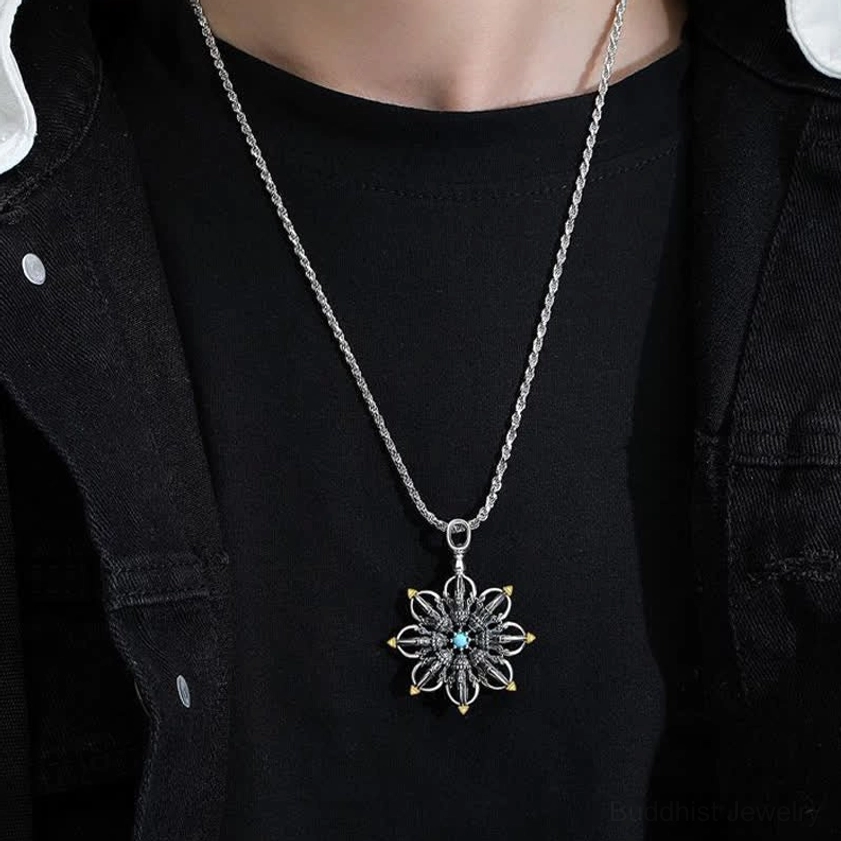 Lotus pendant necklace worn on neck with twisted silver chain, casual lifestyle wear