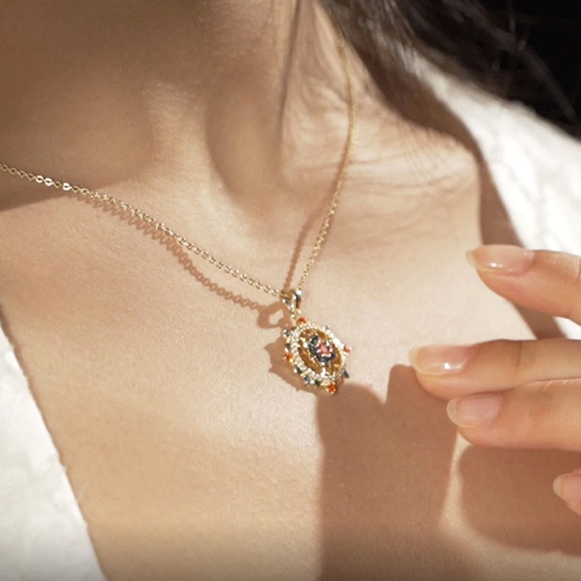 Dainty lotus flower necklace worn on collarbone, showing how the 18.5mm pendant looks in daily wear