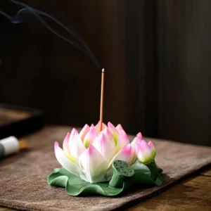 Lotus Pink Edge handcrafted ceramic incense burner with smoking incense stick on wooden surface