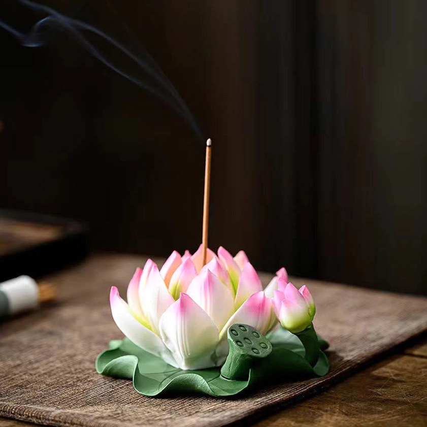 Lotus Pink Edge handcrafted ceramic incense burner with smoking incense stick on wooden surface