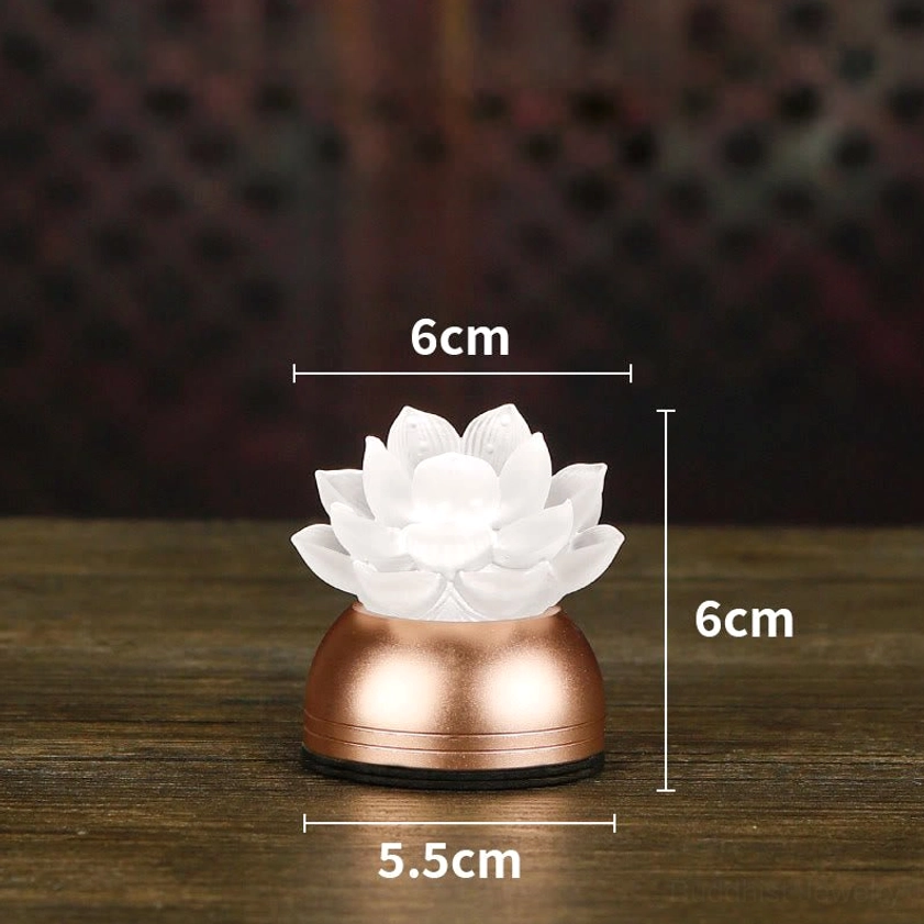 White lotus liuli glass prayer light with copper base creating serene spiritual focal point