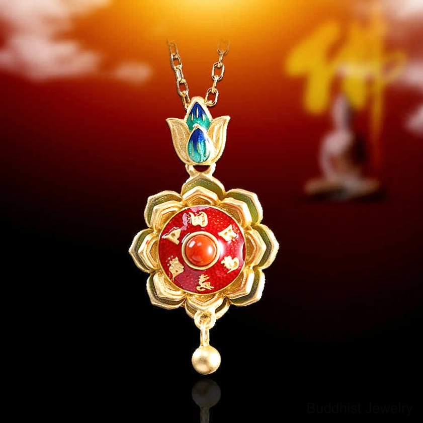 Buddhist lotus prayer wheel pendant featuring red enamel center and blue-green cloisonne details with sterling silver setting
