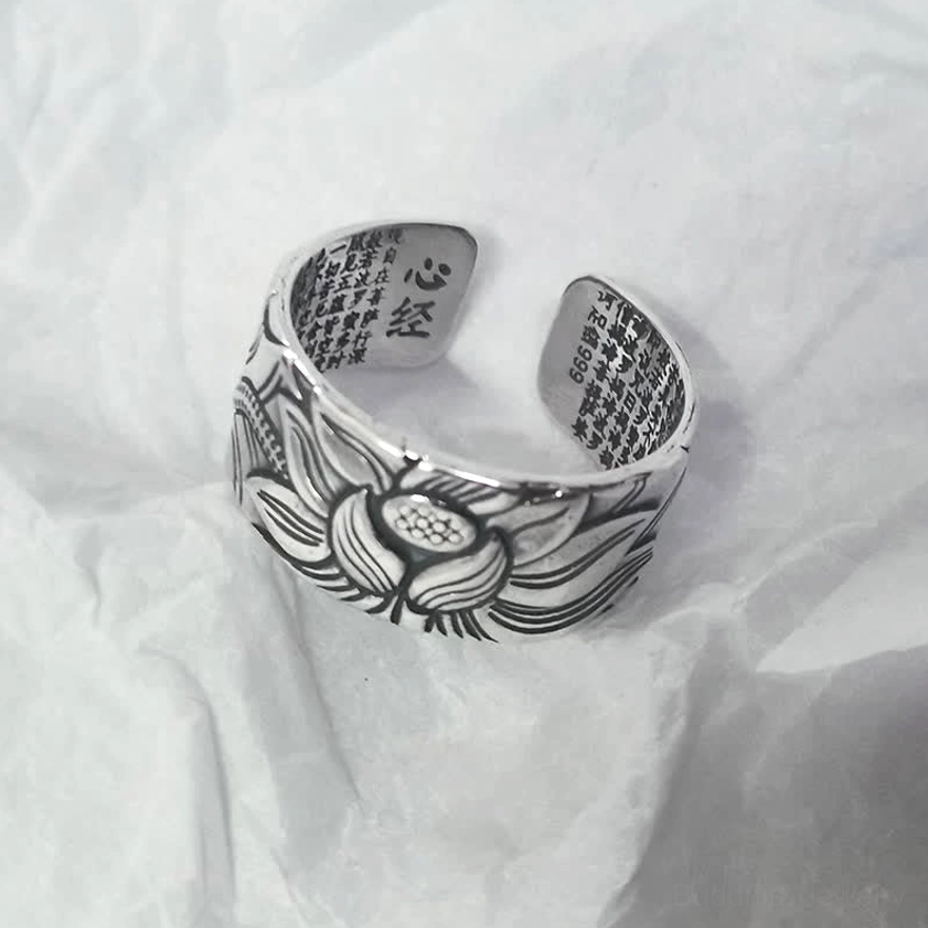 Adjustable Sterling Silver Lotus Ring – Oblique View Showing Heart Sutra Engraving and Open Cuff Design