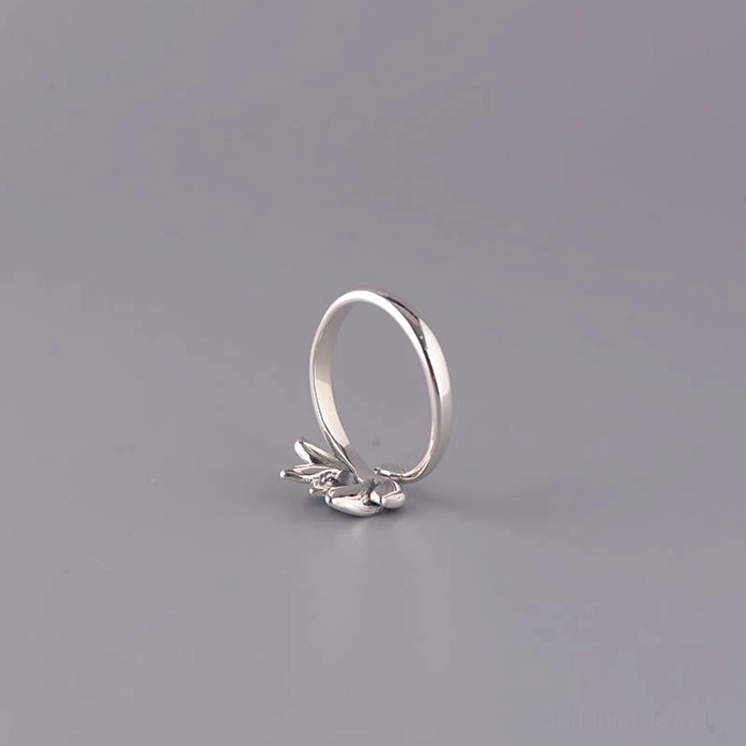Rear side view of lotus silver ring showing smooth polished inner structure