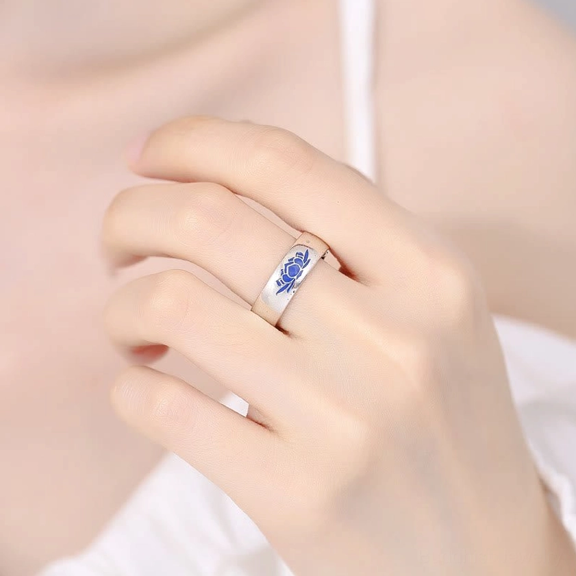 Blue lotus copper ring worn on hand showing how the spiritual Buddhist ring looks when worn on finger