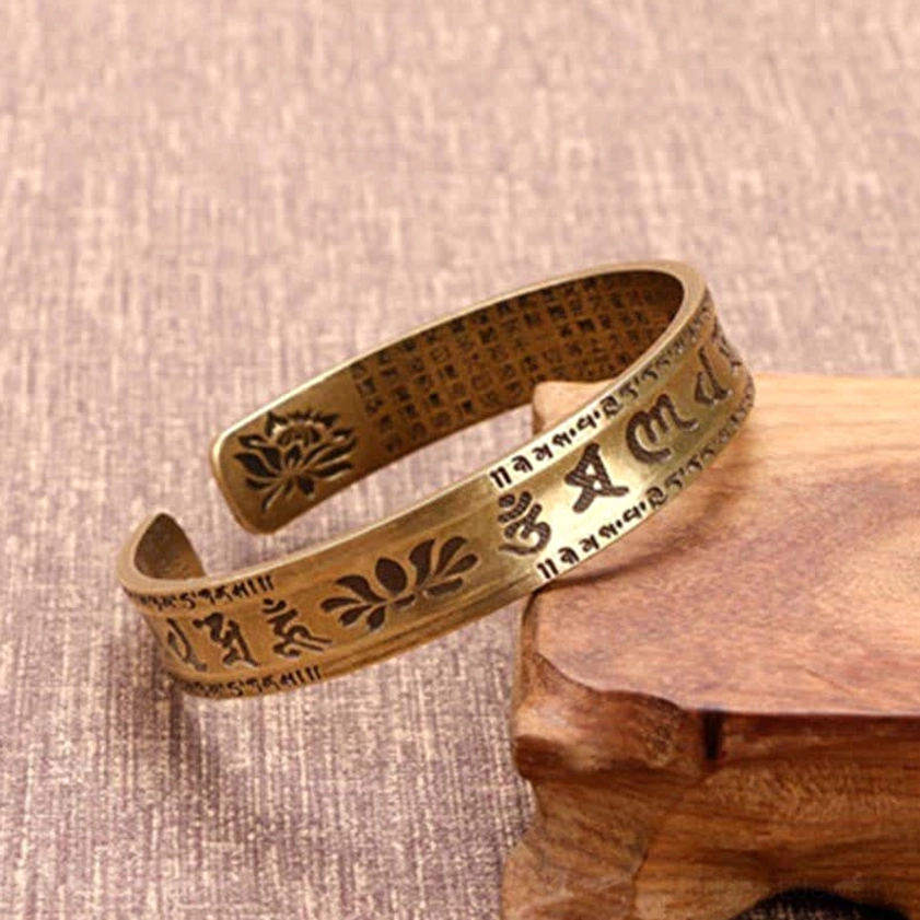Lotus and Sanskrit text engraved brass open cuff bangle bronze tone