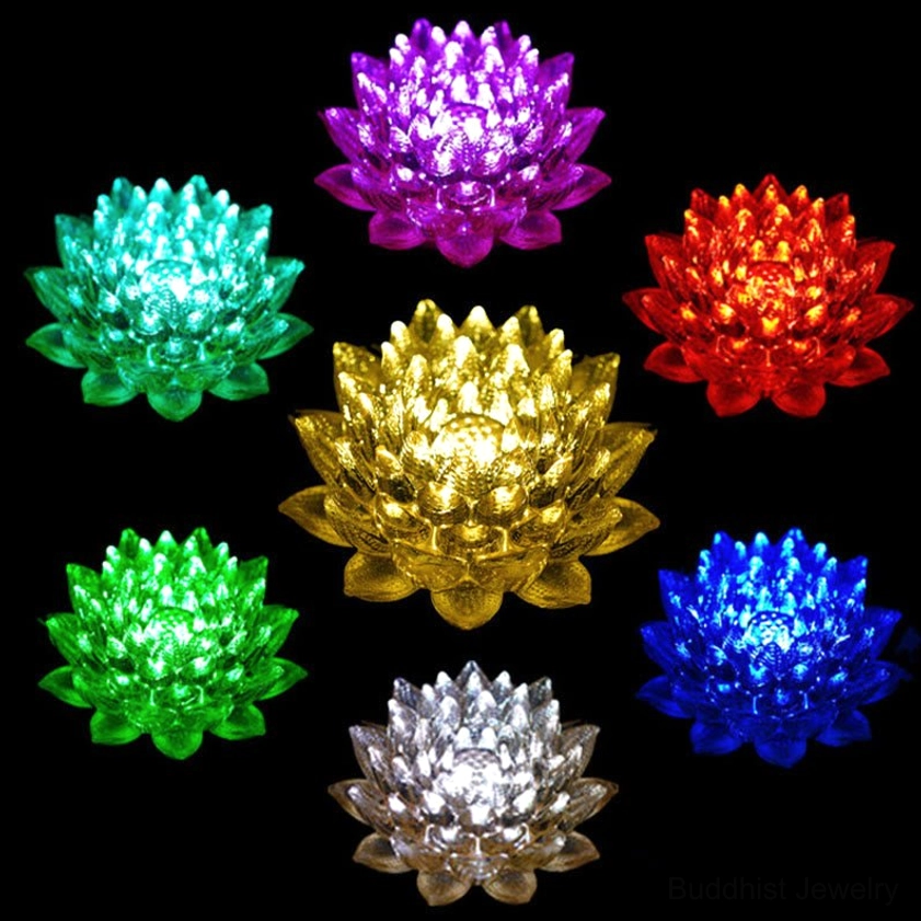 Lotus sculpture showing golden and orange color variations, artistic glass design