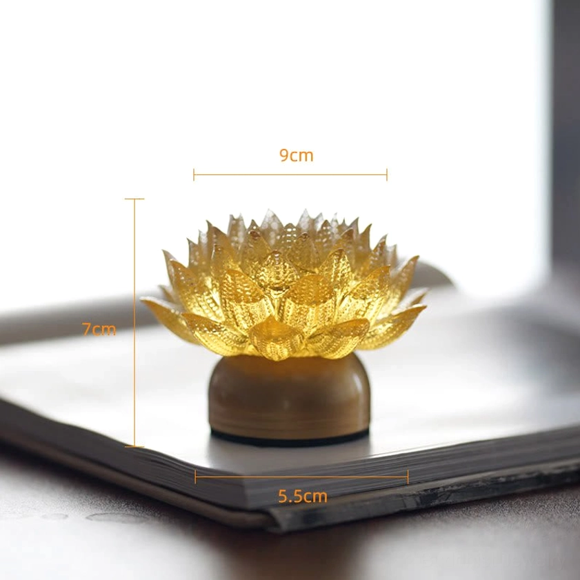 Lotus illuminated sculpture creating meditative ambiance, soft warm glow for spiritual practice