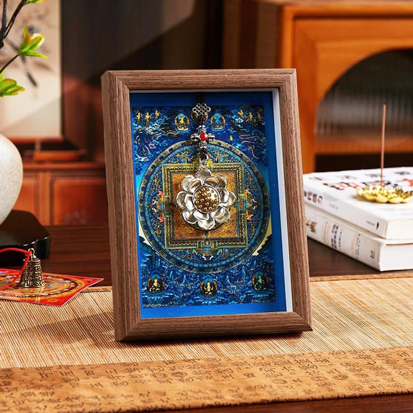 Buddhist lotus thangka photo frame with blue mandala design in dark walnut wood finish on traditional home décor setting