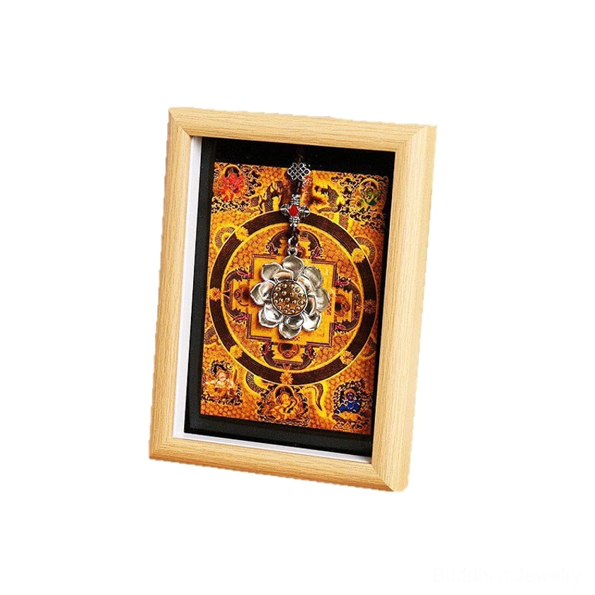 Angled view of sacred lotus thangka frame with golden yellow mandala and natural wood finish detail