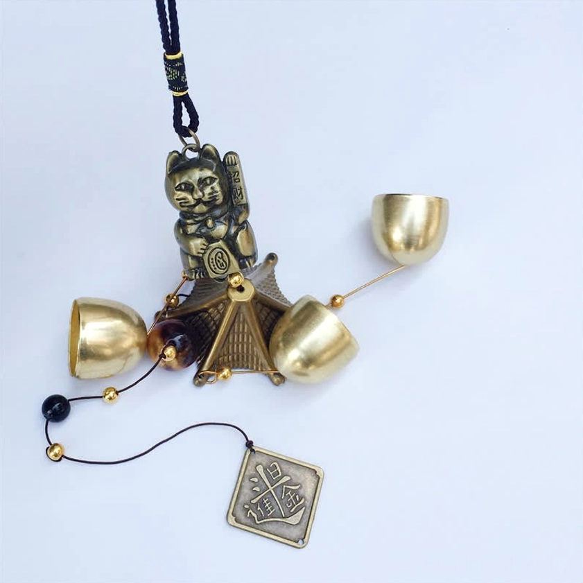 Lucky cat wind chime side flat lay all components cat charm pavilion bells tag