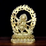 Mahakala six-armed copper statue frontal view with brass golden finish, flame aureole, and lotus pedestal - Buddhist deity statue for meditation and spiritual protection