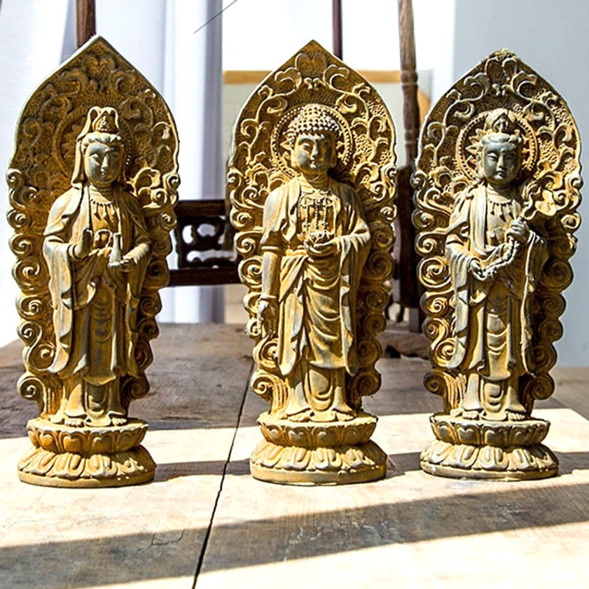 Protective angle of Buddhist trinity statue highlighting Mahasthamaprapta spiritual strength and resilience symbolism in handcrafted resin sculpture