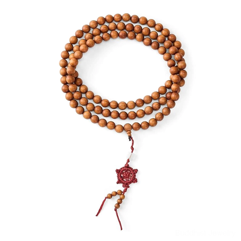 Buddhist meditation mala in sandalwood with instructions for using prayer beads