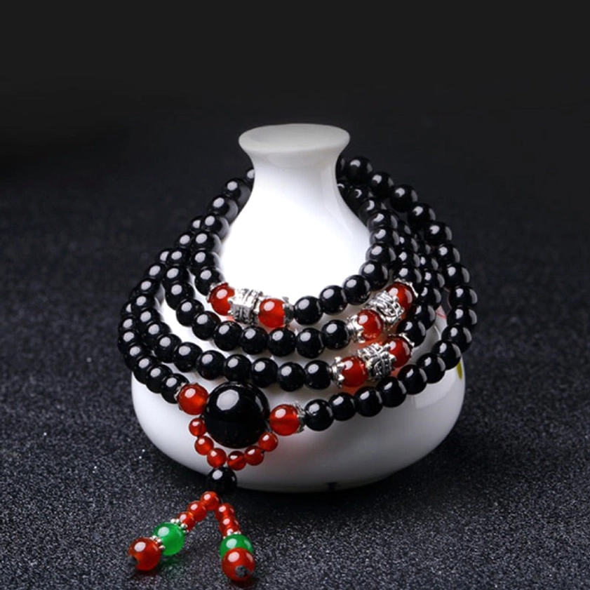 Buddhist mala bracelet sizing guide showing 6mm and 8mm bead options for 108 bead prayer mala