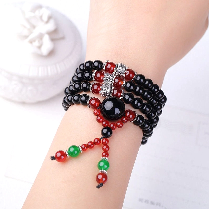 108 bead Buddhist prayer mala necklace conversion showing how bracelet transforms into longer meditation mala