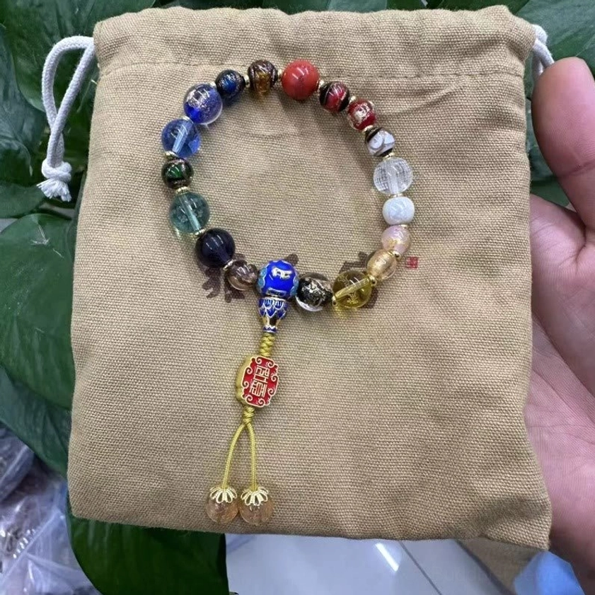 Handmade 18-bead Buddhist prayer mala with mixed clear and colored incense ash liuli glass beads, enamel pendant, and golden bell tassels in storage bag