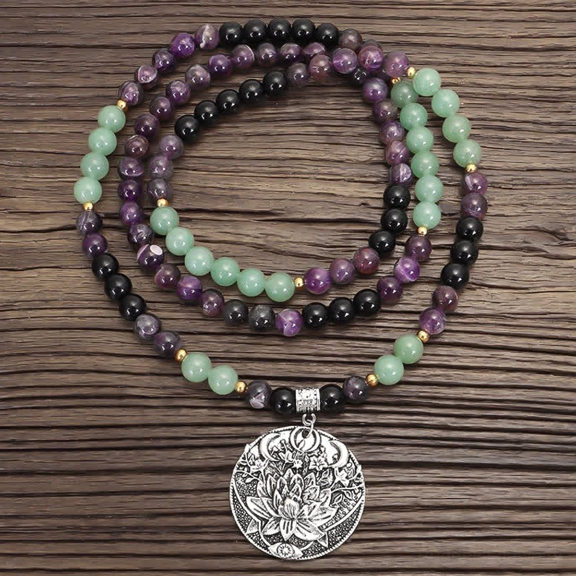 108 mala necklace with amethyst green aventurine beads and engraved silver lotus charm pendant, long meditation prayer necklace flat lay