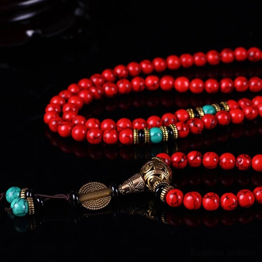 Loose 108-bead Buddhist mala strands with red turquoise beads and bronze tassel pendant