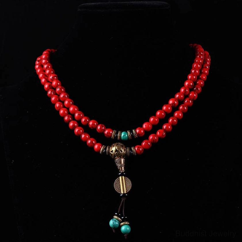 108-bead prayer mala worn as necklace on mannequin, front display with turquoise accents