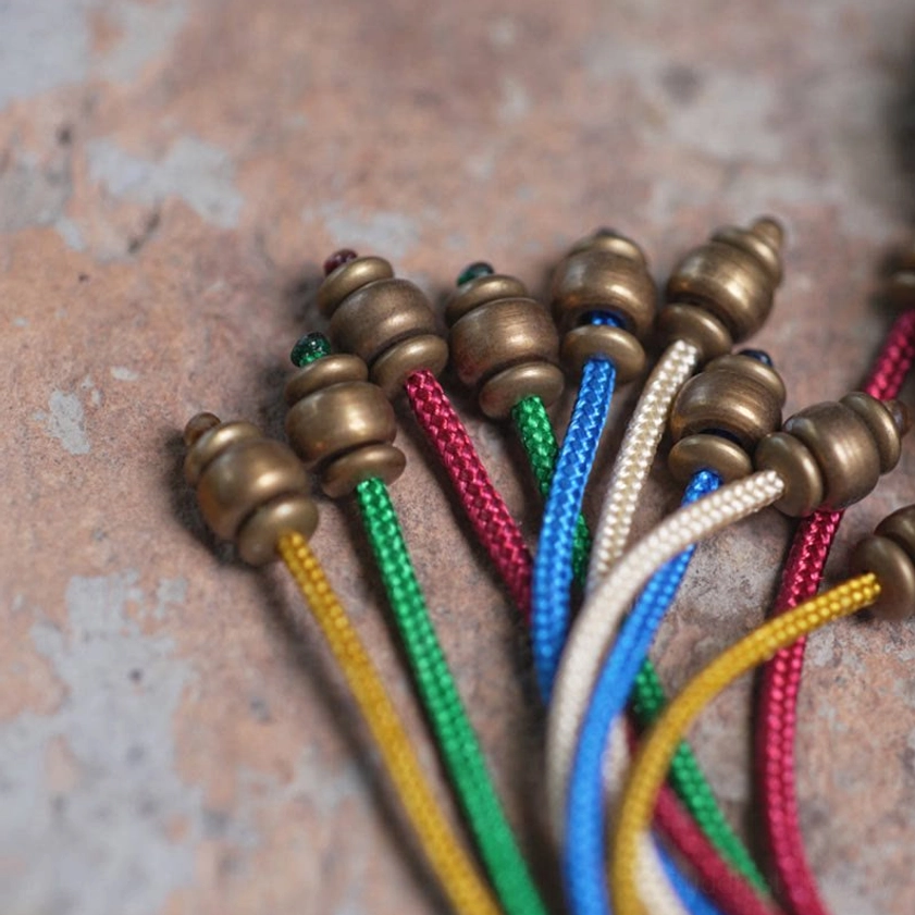 Multicolor silk tassel and bronze copper metal beads - Buddhist mala bracelet detail