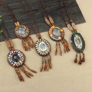 Collection of handcrafted mandala beaded pendant necklaces in various styles showing colorful mosaic designs and brown leather cords
