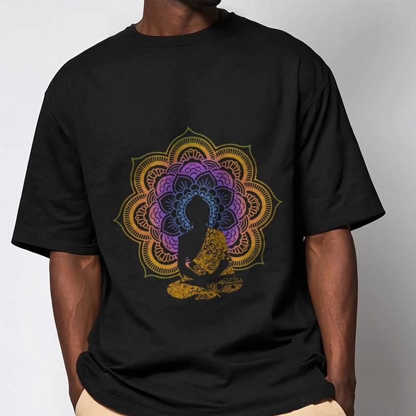 Black mandala Buddha spiritual graphic T-shirt worn by man showing relaxed unisex fit and vibrant printed design