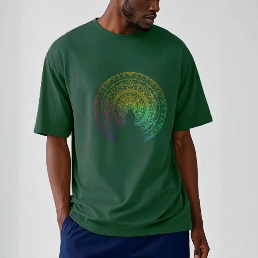Man wearing dark green mandala Buddha t-shirt half-body front view showing relaxed casual fit with chest graphic