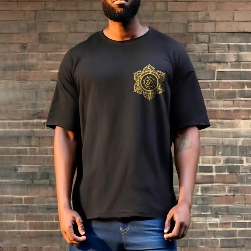 Man in black mandala OM spiritual t-shirt outdoor brick wall lifestyle shot