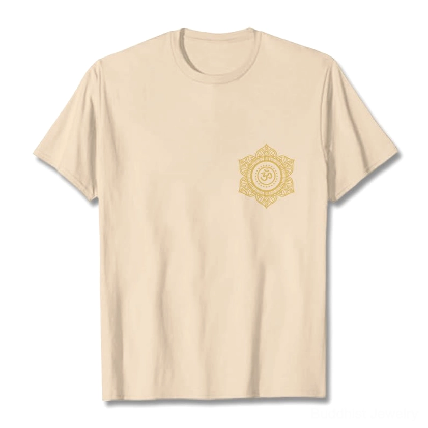 Light cyan Buddhist mandala OM t-shirt flat lay with gold spiritual design