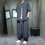 Men's dark slate gray mandarin collar frog button shirt with geometric harem pants - front partial view