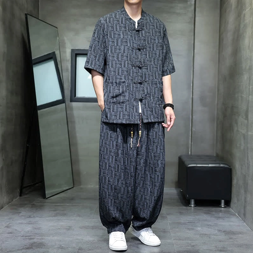 Men's frog button mandarin collar shirt with geometric harem pants - side view showing functional pockets
