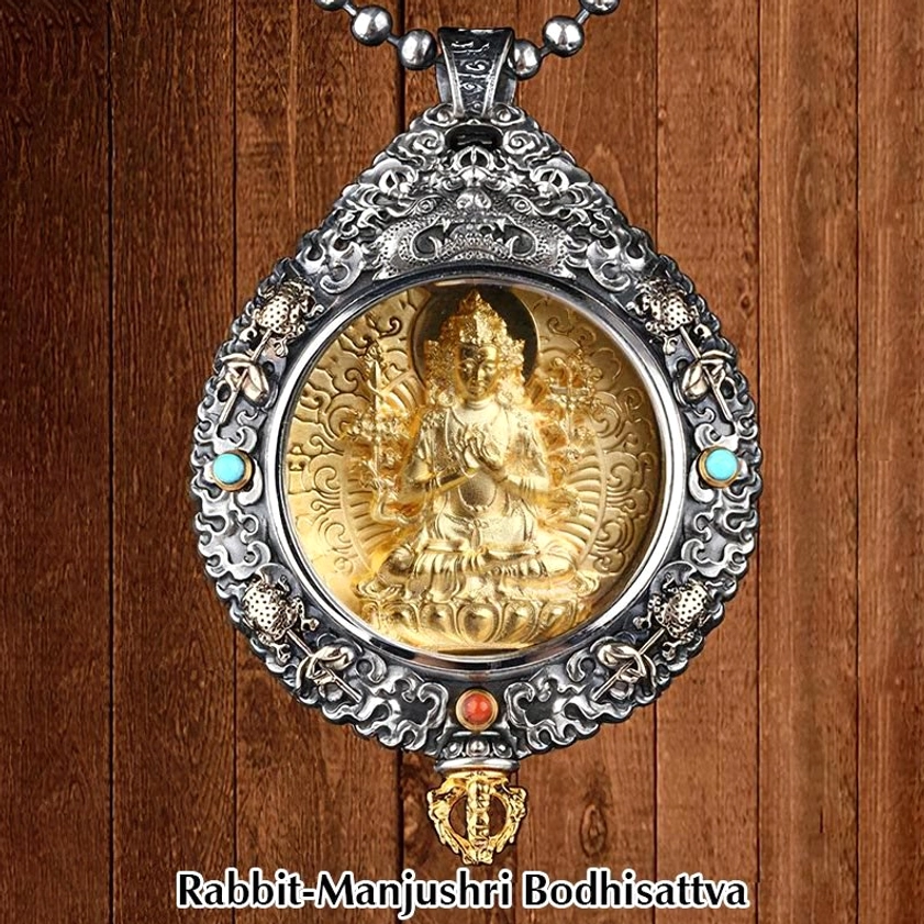 Manjushri Bodhisattva zodiac pendant for Rabbit sign with gold relief, turquoise and red bead inlay, vintage silver frame