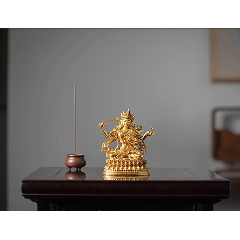 Four-armed Manjusri Bodhisattva statue with incense burner Buddhist altar setup